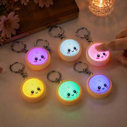 🔥 ÚLTIMO DIA: 50% DE DESCONTO 🔥 Chaveiro Fidget fofo em formato de bolinho (dumpling) – luz ativada pelo toque